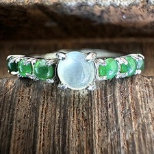 Grade A Burma Jadeite Ring with Light Green and Six Smaller Vivid Green Gemstone