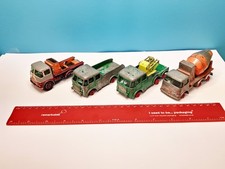 four vintage Matchbox King Size die-cast toy trucks made by Lesney in England...
