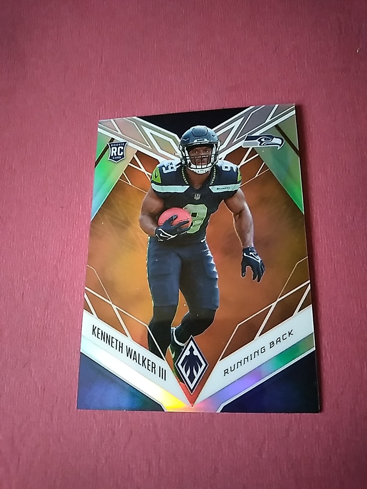 2022 Panini Phoenix - Rookies Kenneth Walker III #118 Orange /99 (RC)