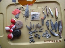 Fishing lures, lead sinkers, [ some home made], plugs and bobbers sold as a lot