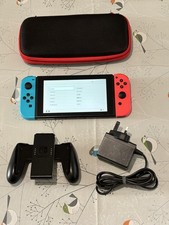 Nintendo Switch Console Bundle inc Neon Red & Blue Joy-Cons, Dock, Grip & Case