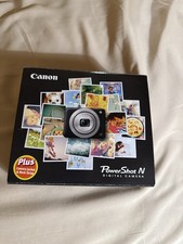 Canon PowerShot N Compact Digital Camera with Camera Jacket  Neck Strap