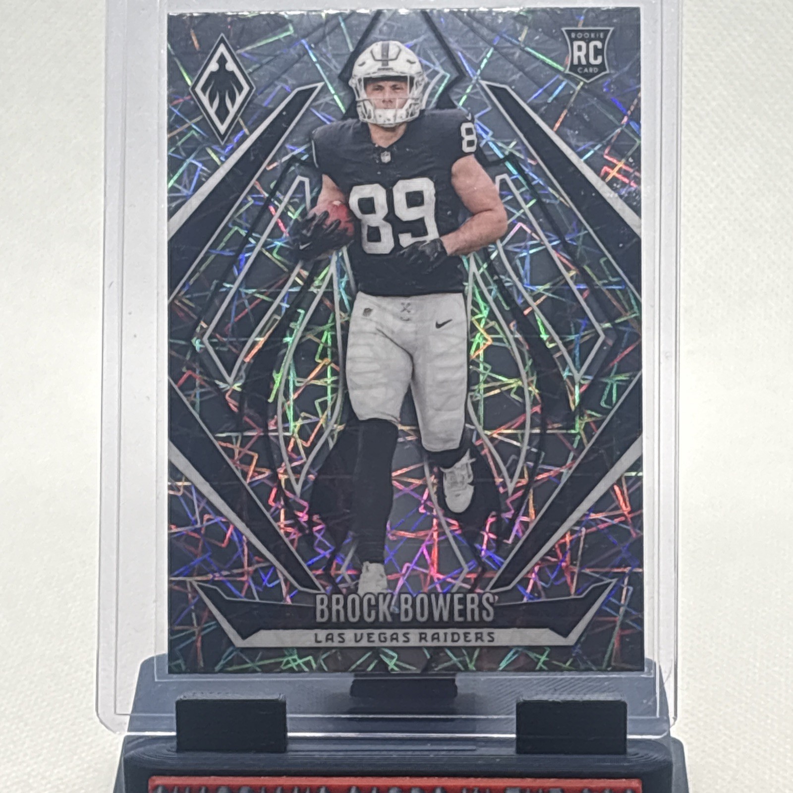 2024 Panini Phoenix - Rookies Brock Bowers #165 Lazer (RC)