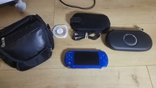 Sony PSP 3000 Blues 2 Games Carry Case and 2 cases with charger cable