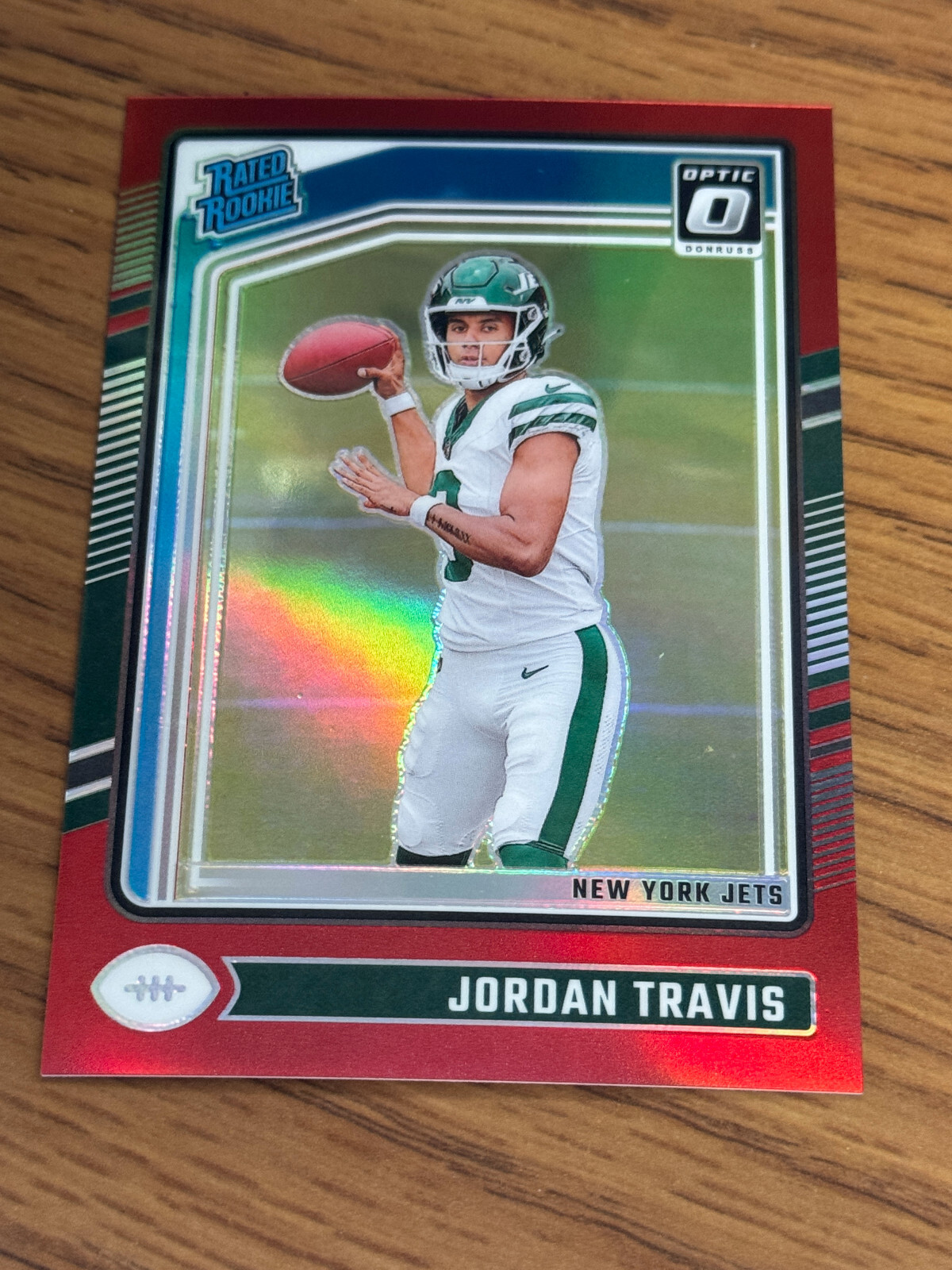 2024 Panini Donruss Optic #260 Jordan Travis Rated Rookie Red Prizm /125 Jets