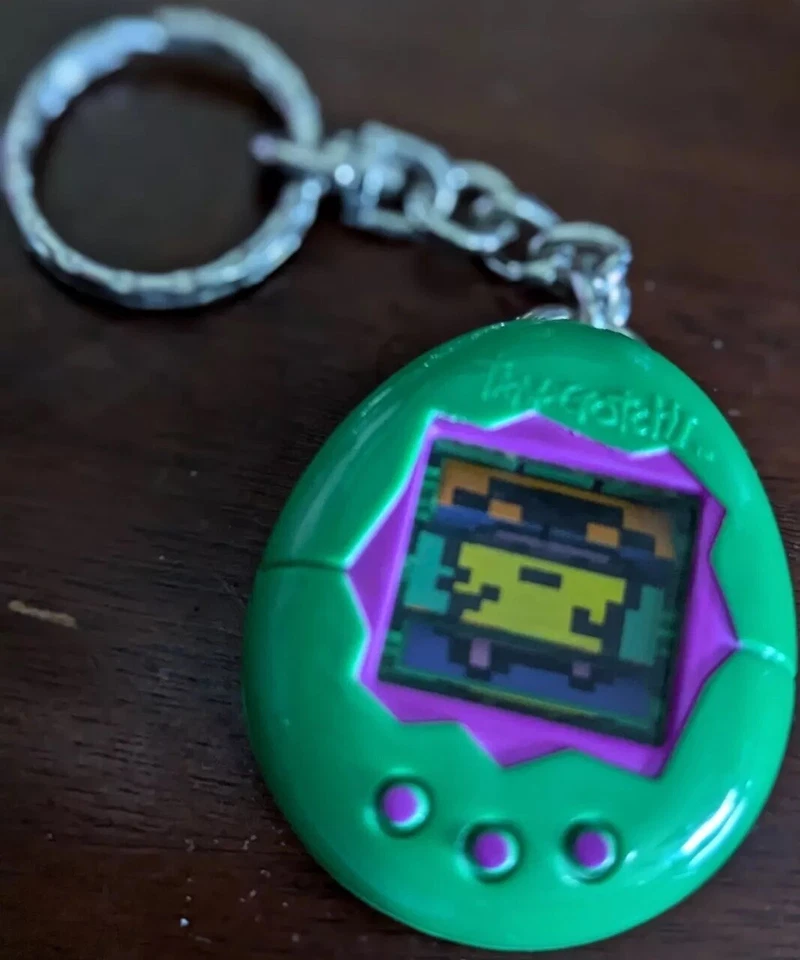 Llavero Tamagotchi Vintage 1997 McDonalds Juguete Llavero Verde Años 90 Bandai Foto 3 de 4