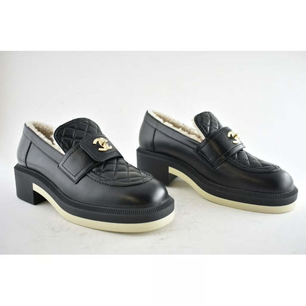 Chanel 21B Black Quilted Turnlock CC Logo Gold Shearling Fur Mule