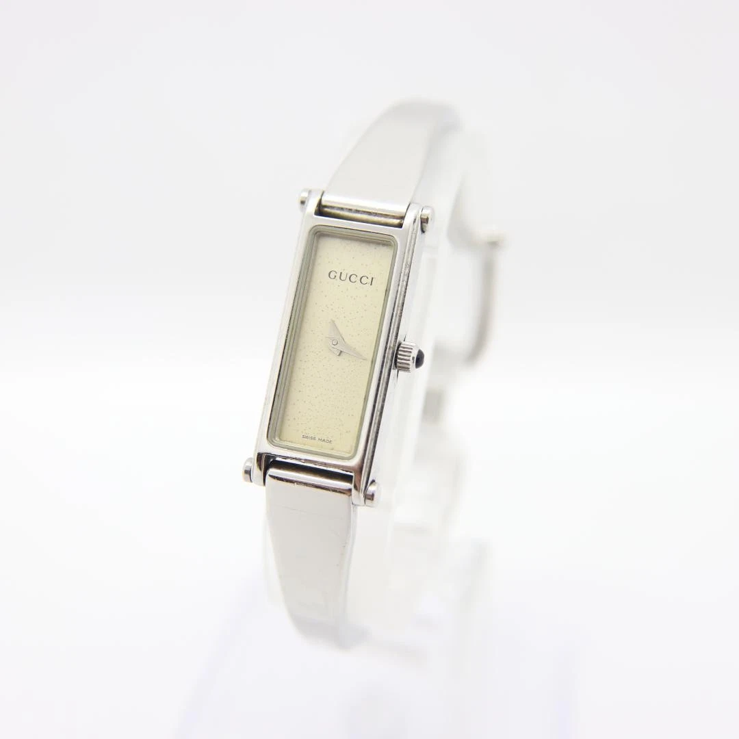 Montre Gucci 1500L femme quartz vintage argent 12 mm fabrication suisse rectangle
