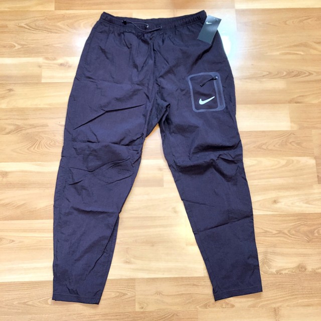 burgundy nike track pants