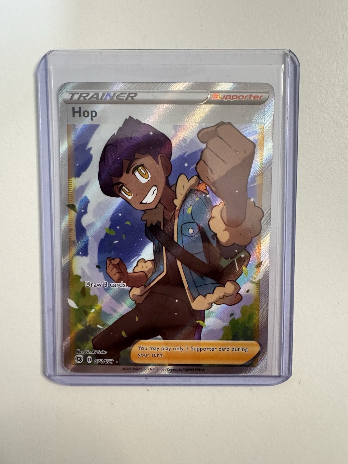 Pokemon TCG Hop Trainer 73/73 Ultra Rare Holo Champion's Path