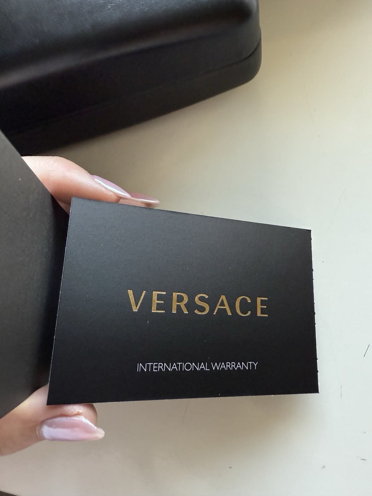 Versace Sunglasses Black frames with dark grey lens and gold medusa detail image 6
