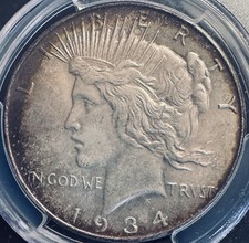 1934 $1 VAM-1B Pitted Left Reverse, (RS) Peace Dollar PCGS MS-63 Rainbow Toning