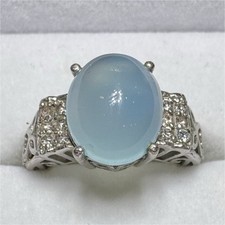Sterling Silver Ring with Oval Blue Chalcedony Solitaire and Accent Stones