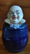 Ancien pot à tabac - tête d'un Bourjois bon vivant sur un tonneau bleu