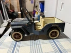 vintage tonka jeep with a star on the hood