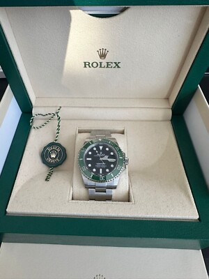 Rolex Submariner 126610LV Silver Oyster Bracelet with Green Bezel. Box + Papers