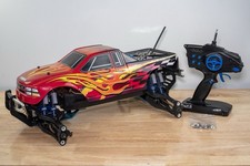 TEAM ASSOCIATED MGT 1/8 PRO .21 NITRO MONSTER...