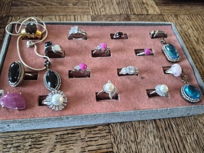 Large lot of older sterling rings and pendants some original paperwork 