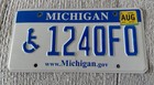 Michigan License Plate Handicapped # 1240F0 Blue and White 2010's — photo 1