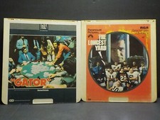 2-CED VIDEO DISCS THE LONGEST YARD  GATOR