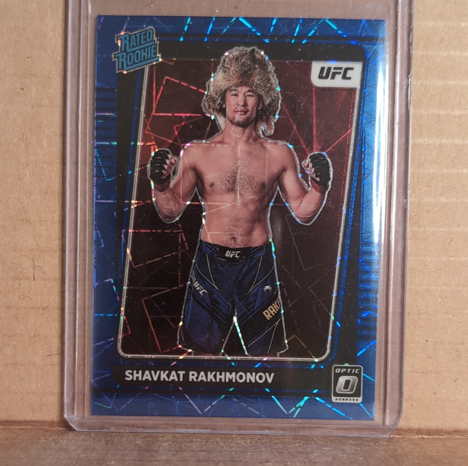 2022 Panini Donruss Optic UFC Shavkat Rakhmonov #115 Rated Rookie Blue Velocity