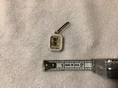 Vintage DAVY CROCKETT plastic charm with vintage clasp in good condition