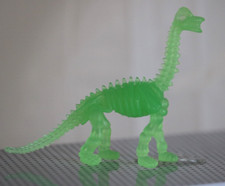 Green DINOSAUR SKELETON FIGURE - 3 Inches Long x 2.5 Inches Tall 3