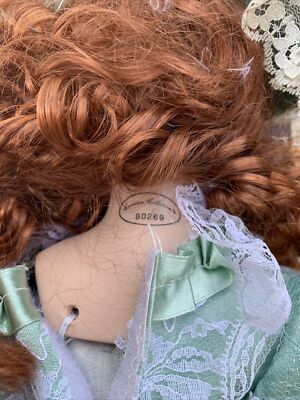 Crimson Collection Porcelein doll