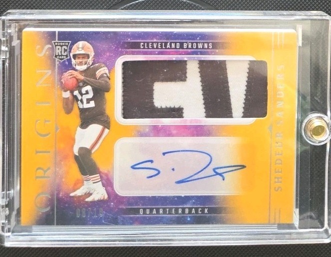 Shedeur Sanders 2025 Panini Origins Gold /10 RPA Rookie Auto RJJ-SSS 
