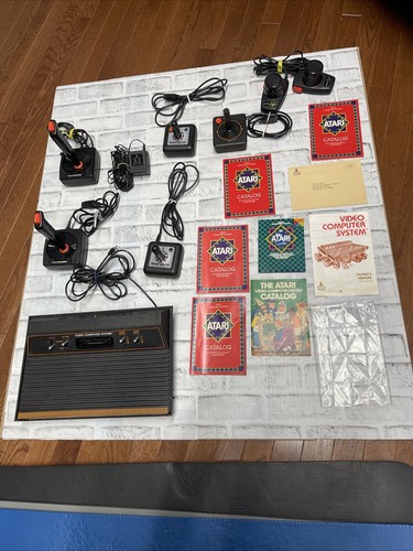 Atari 2600 Video Computer Game System Console Bundle Joysticks Paddles Tested - Picture 1 of 6