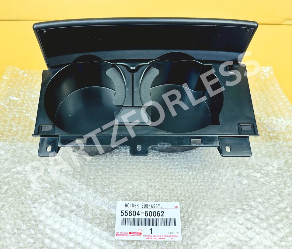 55604-60062 TOYOTA Land Cruiser SOPORTE SUBCONJUNTO, PANEL DE INSTRUMENTOS TAZA NUEVO OEM Foto 2 de 4