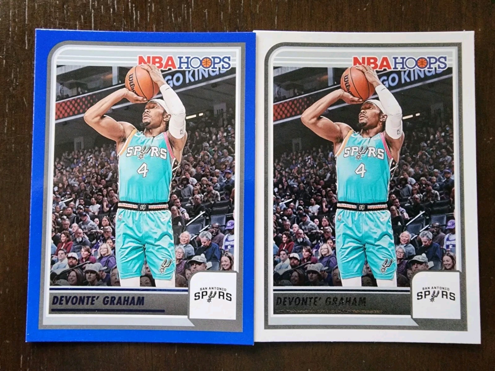 2023-24 Panini NBA Hoops Devonte Graham Blue Parallel + Base Card #219