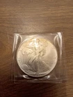 1986 1 oz Silver American Eagle (Brilliant Uncirculated) plastic flip holder