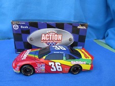 NASCAR 36 DERRIKE COPE ACTION PLATINUM SKITTLES PONTIAC 1/24 DIECAST BANK NIB