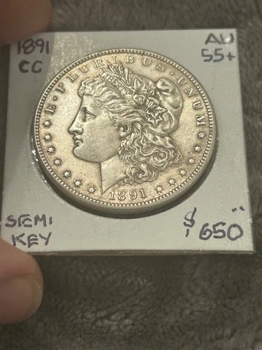 Semi-KEY 1891-CC MORGAN SILVER DOLLAR. AU++/UNC,