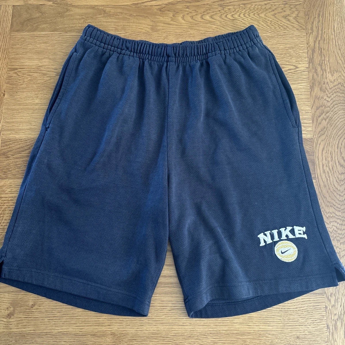Preços baixos em Nike Poliéster década de 1990 vintage de Roupas