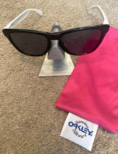 New Oakley Frogskins Sunglasses Black w Black Lens w White Arms w Teal Logo