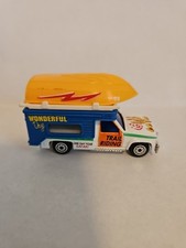 Realtoy Wonderful Day Trail Riding Camper With Orange Boat On Roof Diecast