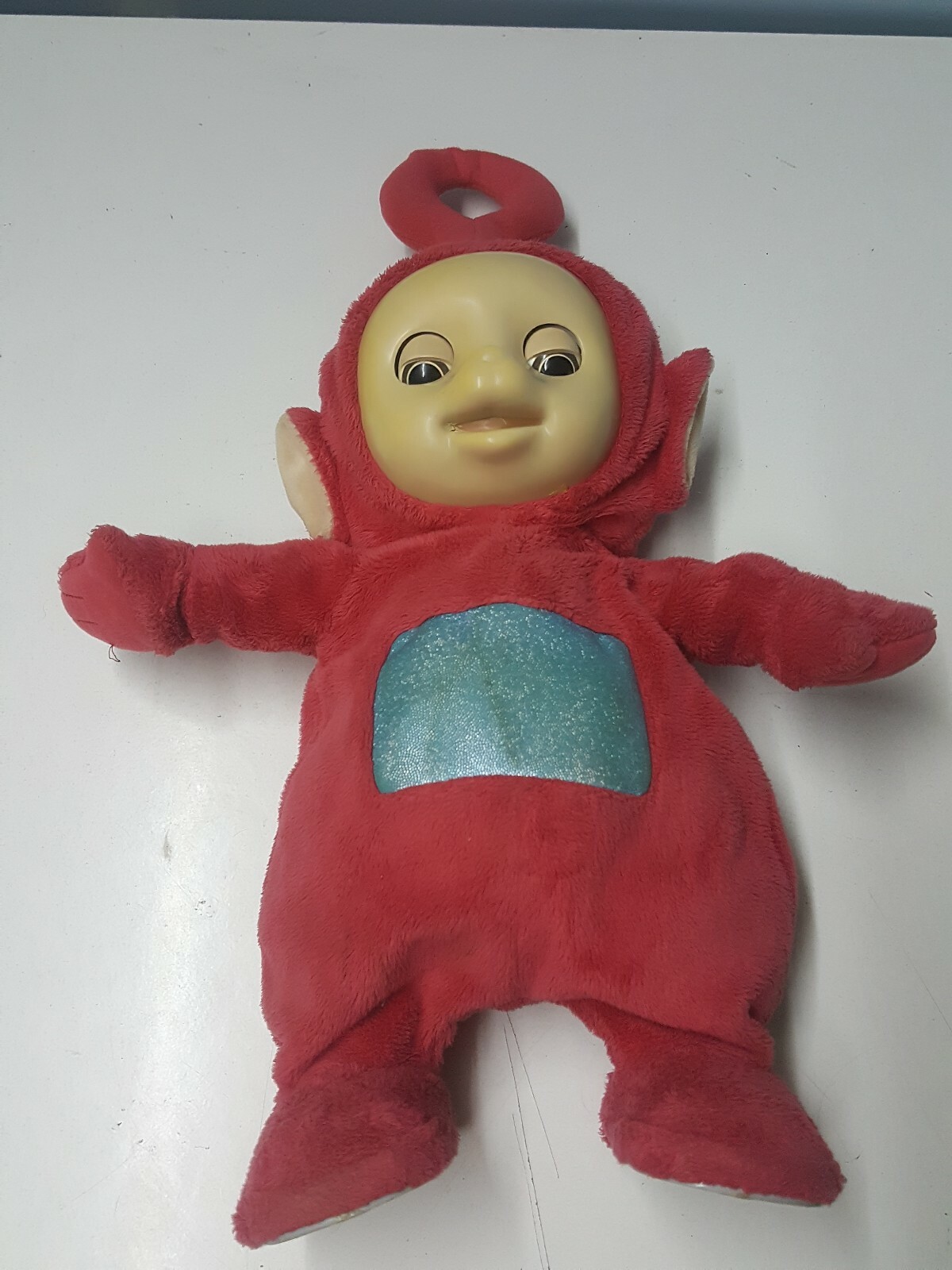 Muñeco Po De Teletubbies 40 Cm Con Musica Que Baila Y Cierra Y Abre Los Ojos