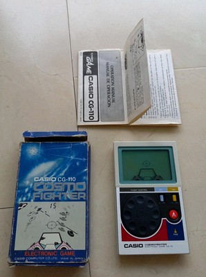 Casio Cosmo Fighter CG-110 Handheld LCD Videospiel Game Watch OVP CIB