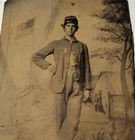 ORIGINAL CIVIL WAR TINTYPE OF UNION SOLDIER UNIDENTIFIED CAMP SCENE WITH MEDAL