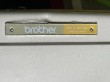 A Collection Of Knitting Equipment. Including A Knitting Machine.