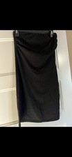 Mini black bodycon dress. New without tags. Size M.