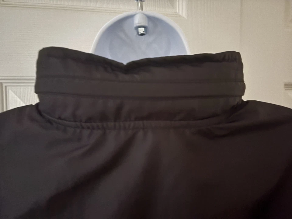 Chaqueta con capucha Tek Gear Performance Active Rain Wind para mujer negra talla pequeña Foto 2 de 4