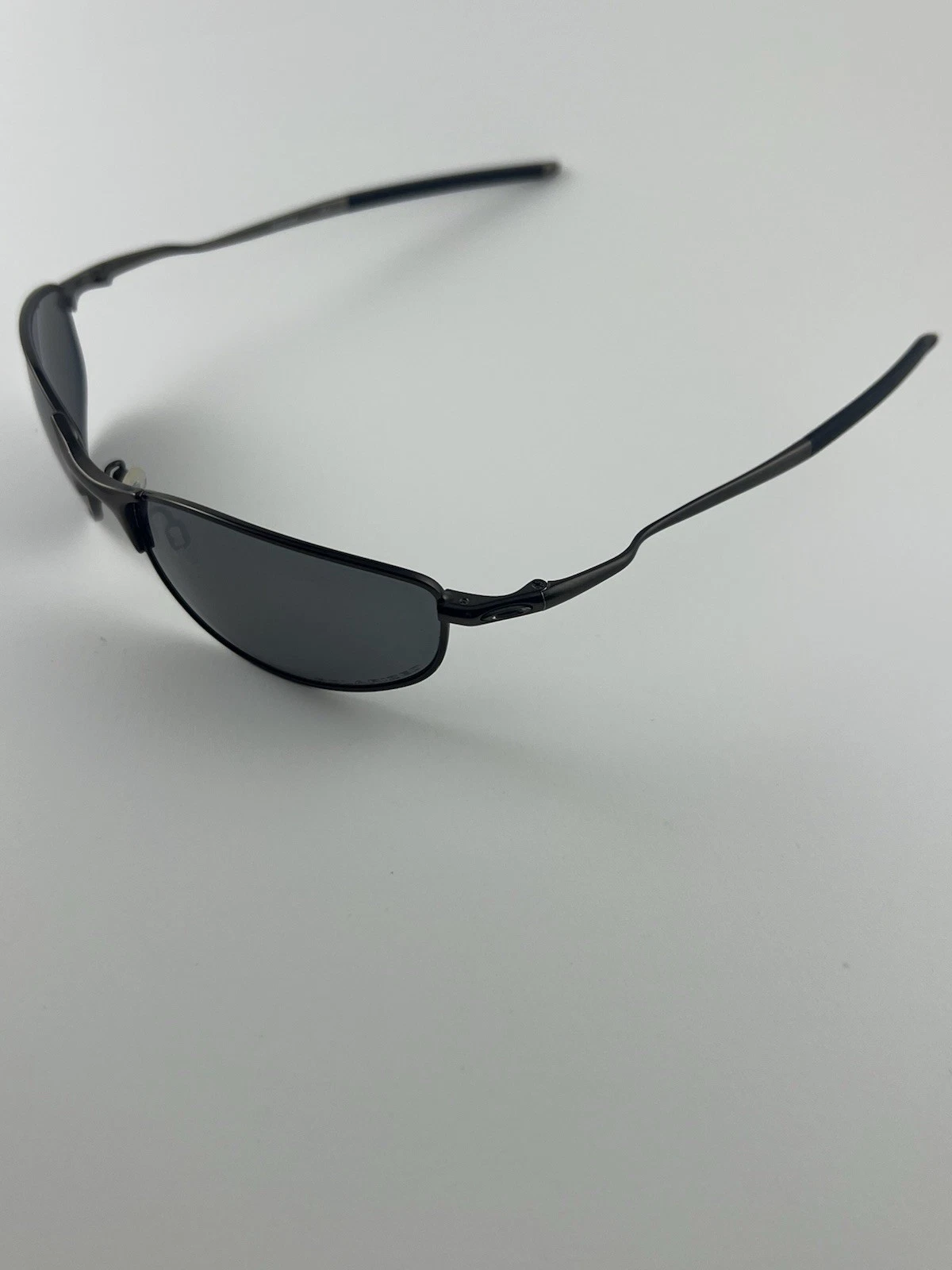 Oakley Tightrope Pewter Black Iridium Polarized OO4040 02 Wire Whisker RARE