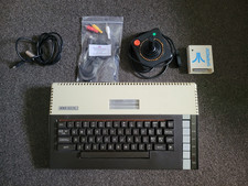 Atari 64k 800XL PAL + A8Picocart (16MBstorage) w/100s of games & joystick,AV,pwr