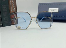 Gucci GUCCI GG0817S 004 GOLD POLYGON SUNGLASS GOLD LIGHT BLUE