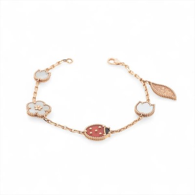 Van Cleef & Arpels Glücksfeder Karneol Onyx Muscheln Armband 750 (PG) 11,2g