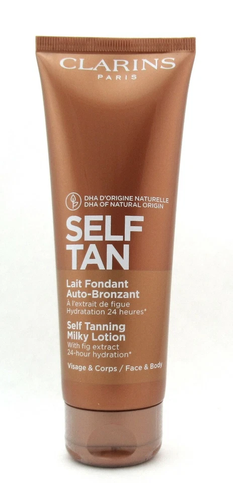 Loción lechosa autobronceadora Clarins con extracto de higuera cara y cuerpo 4,2 oz. Nuevo Foto 2 de 4