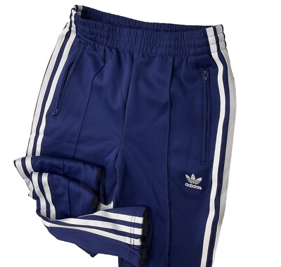 grey and white adidas sweatpants